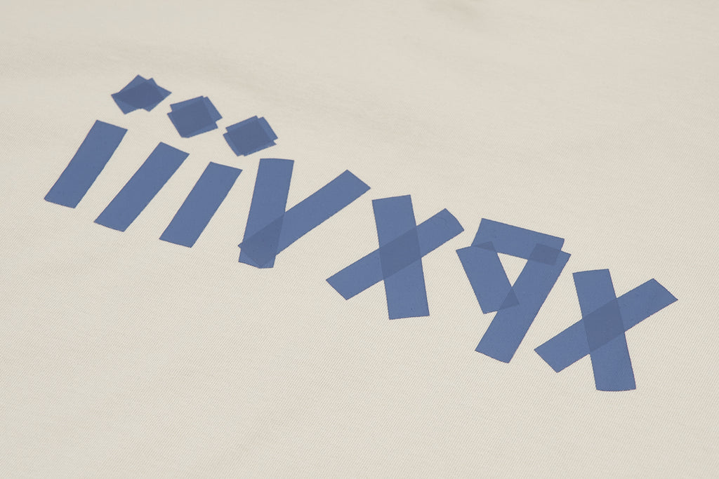 XPX “XPXVIII.” TAPE LOGO CREW NECK TEE IN BEIGE